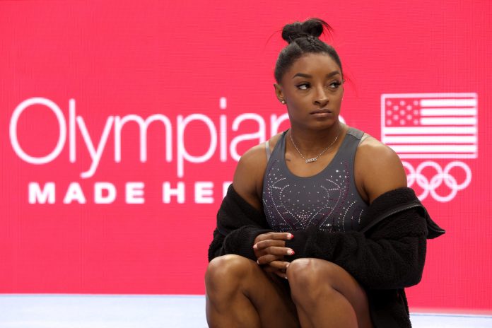 Simone Biles looks on prior to the start of Day Two of the 2024 U.S. Olympic Team Gymnastics Trials at Target Center on June 28, 2024 in Minneapolis, Minnesota. 