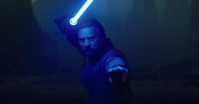 Obi Wan holding his lightsaber above his head, ready to duel